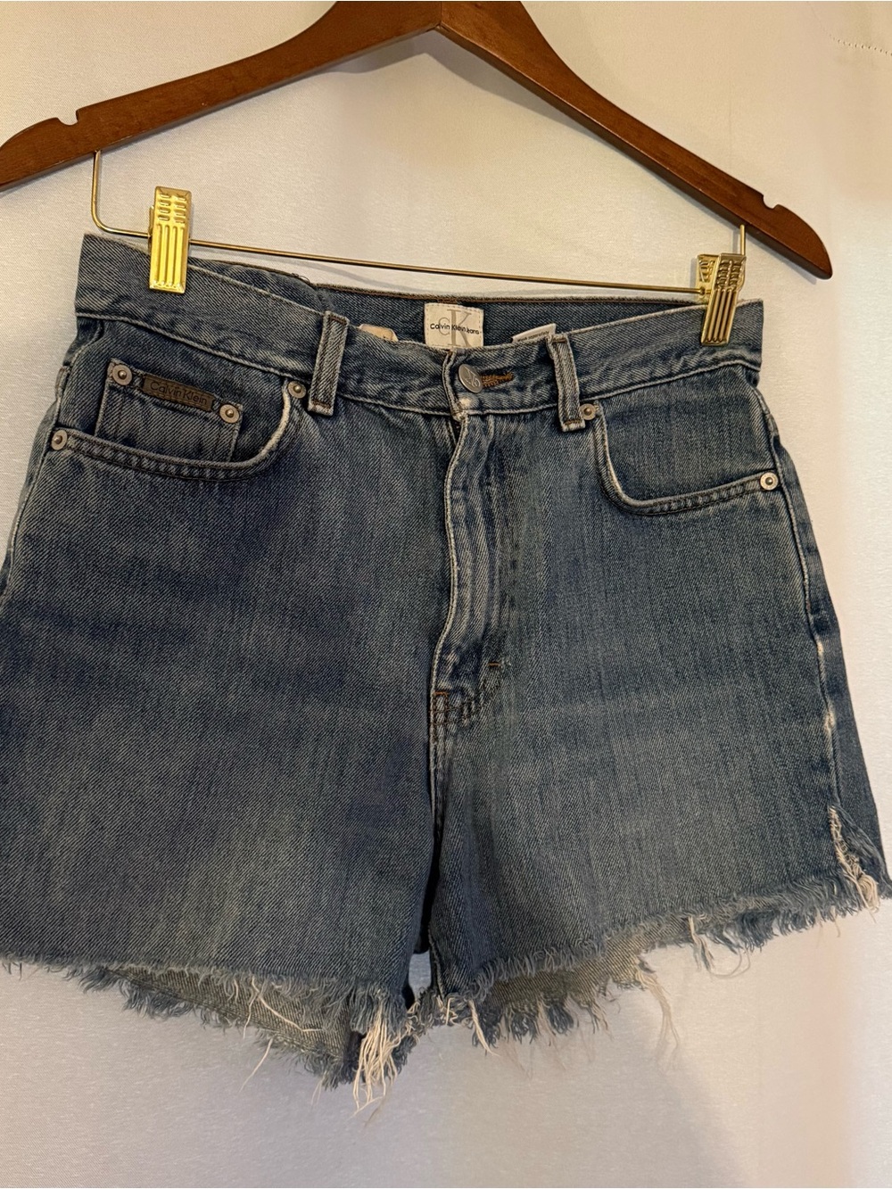 Calvin Klein Distressed Blue Denim Cutoff Shorts